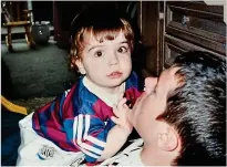  ??  ?? PIC 1: Two-year-old Elliot with Rob in their Co Durham house in 1996