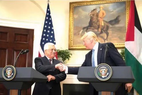  ??  ?? President Trump met with the Palestinia­n leader, Mahmoud Abbas, in the Oval Office on Wednesday. Stephen Crowley/The New York Times