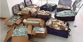  ?? AFP PIC ?? Brazilian currency seized in a flat used by former minister Geddel Vieira Lima in Salvador on Tuesday.