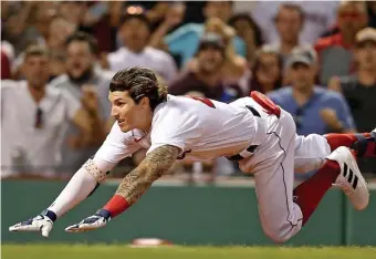  ?? MATT STONE / HErALd STAFF FILE; bELOW, STuArT CAHILL / HErALd STAFF FILE ?? SIDELINED: Jarren Duran became the eighth Red Sox to test positive for COVID-19 since Aug. 27. Below, Adam Ottavino has not allowed an earned run since Aug. 15.