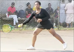  ?? ?? Andiswa Dlamini (L) will play Sakhizwe Malindzisa in the SBS Junior Tennis semifinals. (INSET) Siteki Tennis Coach Njabulo Mbhamali (L) with ENTA President Derick Jele seated next to the trophies. (R) Khayelihle Ndzimandze in action during the SBS Junior Tennis Tournament.