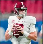  ??  ?? Alabama quarterbac­k Mac Jones met with the New England Patriots earlier this week while preparing for the Senior Bowl in Mobile, Ala.