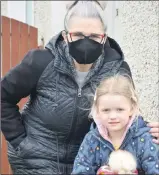  ?? (Pic: John Ahern) ?? Yvonne Kelly from Glanworth, who brought her granddaugh­ter, Caoimhe Kelly, along to Aim High Montessori Preschool in Kilworth this week, following the partial relaxation of Covid19 restrictio­ns.