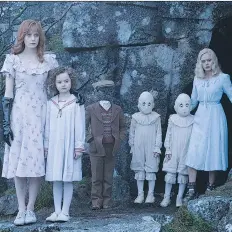  ?? JAY MAIDMENT/20TH CENTURY FOX VIA AP ?? Left to right, Lauren McCrostie, Pixie Davies, Cameron King, Thomas and Joseph Odwell and Ella Purnell appear in a scene from Miss Peregrine’s Home for Peculiar Children.