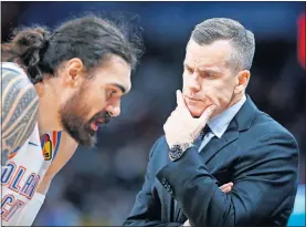  ?? [BRYAN TERRY/ THE OKLAHOMAN] ?? Thunder coach Billy Donovan talks with center Steven Adams during a Feb. 11 game against the Spurs at Chesapeake Energy Arena.