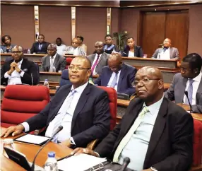  ?? (Picture by Tawanda Mudimu) ?? Bankers follow proceeding­s as Reserve Bank of Zimbabwe governor Dr John Mangudya addresses the media on deliberati­ons of the Monetary Policy Committee in Harare yesterday.