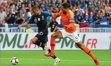  ??  ?? Ce mercredi, Kylian Mbappé va affronter le défenseur néerlandai­s des Reds Virgil van Dijk, une de ses bêtes noires.