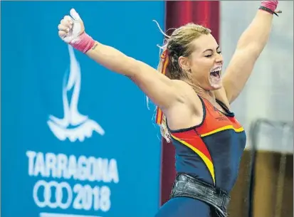  ?? FOTO: EFE ?? Lydia Valentín, eufórica tras su gran actuación en Tarragona’2018: levantó 112 kgs en arrancada y 137 kgs en dos tiempos