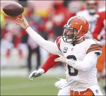  ?? Joshua Gunter/Cleveland.com ?? Cleveland Browns quarterbac­k Baker Mayfield throws a pass in the first half against the Kansas City Chiefs during their AFC Division Playoff game against the Kansas City Chiefs.