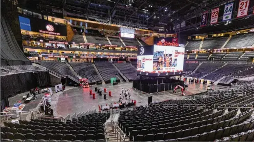  ?? STEVE SCHAEFER/STEVE.SCHAEFER@AJC.COM ?? The main convention would be held in State Farm Arena, which would get a face-lift as soon as the NBA season ends. “About the whole month of July and half of August, people will be in there working,” says Mark Vaughan, executive vice president for the Atlanta Convention and Visitors Bureau.