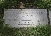  ?? THE HAMILTON SPECTATOR FILE PHOTO ?? Douglas MacRobbie’s Hamilton Cemetery gravestone has been cleaned up.