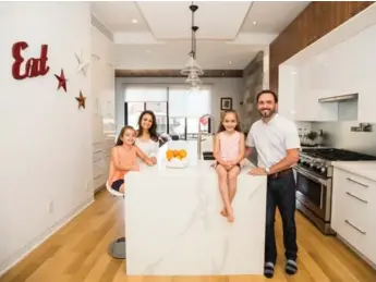  ?? JESSE WINTER PHOTOS/TORONTO STAR ?? From left, Leah, Sofia, Lina and Marco Vieira in their new kitchen. Lina had a lot of input into the kitchen’s design.