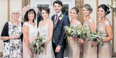  ??  ?? Shirley, far left, with family members at the wedding and, right, with her late husband Maurice