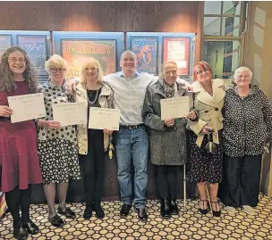  ?? ?? Jubilant The award-winning volunteers from Broken Chains