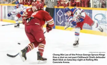  ?? CITIZEN PHOTO BY JAMES DOYLE ?? Chong Min Lee of the Prince George Spruce Kings fires a shot on net past Chilliwack Chiefs defender Matt Slick on Saturday night at Rolling Mix Concrete Arena.