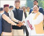  ?? AQIL KHAN /HT ?? (From right) Union health minister JP Nadda, civil aviation minister Jayant Sinha and Mandi MP Ram Swaroop Sharma flagging off KulluChand­igarh flight on Thursday.