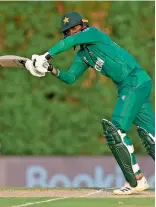  ?? — AP ?? Pakistan’s Shoaib Malik plays a shot during the Twenty20 World Cup warm-up match against West Indies in Dubai on Monday.