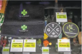  ?? Peter DaSilva / Special to The Chronicle ?? Green Cross cannabis dispensary wouldn’t be able to sell merchandis­e with the shop’s logo if a state bill to limit pot promotion with branded goods passes.