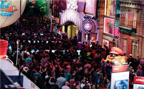  ??  ?? After last year’s Hyrule stylings, Nintendo made up its 2017 booth like New Donk City. It was quite a sight, if you could actually get to it through the crowds