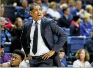  ?? ASSOCIATED PRESS FILE PHOTO ?? UConn men’s basketball coach Kevin Ollie reacts during the first half of the team’s game against South Florida last February.