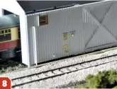  ??  ?? I placed what I had built so far on the layout to check that rolling stock would fit inside. The door was made, complete with a small electronic access keypad, and holes so I could fit some exterior lights at some point.