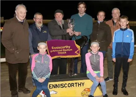  ??  ?? The presentati­on following the Carlow Foods Guys &amp; Dolls Stake final, won by Zaras Oasis at Enniscorth­y Greyhound track on Thursday (from left): Christy Murphy (track director), Jim Turner (racing manager), James Whelan (owner), Bertram Salter (Carlow Foods), James Whelan Jnr., Celine, Luci, Jamie and Sami Salter.