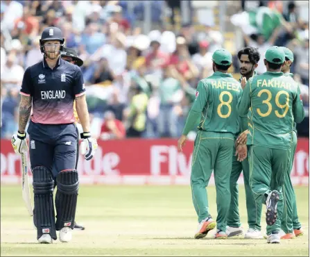  ?? PICTURE: REUTERS ?? PRIZE WICKET: Pakistan players celebrate the wicket of England’s Ben Stokes, left, during yesterday’s ICC Champions Trophy semi-final at Sophia Gardens in Cardiff.