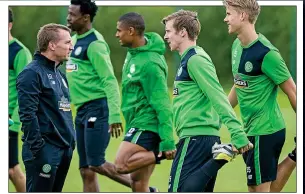  ??  ?? STEADY PROGRESS: Rodgers improved Norwegian pair Johansen and Ajer (right)