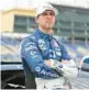  ?? MEG OLIPHANT/GETTY ?? Denny Hamlin, above, finished second behind Bubba Wallace in Sunday’s NASCAR Cup playoff race. Wallace drives for the
23XI Racing team, which is co-owned by Hamlin and Michael Jordan.