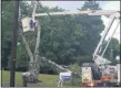  ?? PHOTO BY WILLIAM MARCHETTI ?? A Central Hudson Gas & Electric Corp. crew fixes a damaged power line on Millers Lane, near the border of the city of Kingston and town of Ulster, on Aug. 4, 2020.