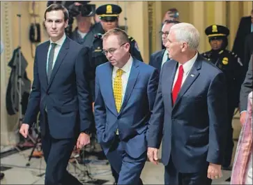  ?? Erik S. Lesser EPA/Shuttersto­ck ?? JARED KUSHNER joined budget director Mick Mulvaney and Vice President Pence, from left, in meetings with Senate Democratic leader Charles E. Schumer and House GOP leaders in efforts to avert the shutdown.