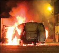  ?? AFP ?? A vehicle burns on a street in Nantes on Friday. —