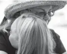  ??  ?? Sandy Phillips, the mother of Aurora theater shooting victim Jessica Ghawi, hugs 17-year-old Hannah Betts, a student activist from Parkland, Fla., at the Capitol in Denver on Saturday.