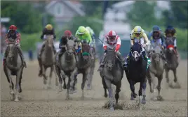  ?? Associated Press photo ?? Cloud Computing (2), ridden by Javier Castellano, wins 142nd Preakness Stakes horse race at Pimlico race course as Classic Empire (5) with Julien Leparoux aboard takes second, Saturday in Baltimore.