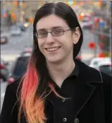  ?? The Canadian Press ?? Lyra Evans, who was elected as a school trustee, poses for a photograph in Ottawa.