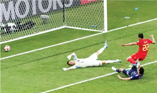  ?? Reuters ?? Belgium’s Nacer Chadli scores his side’s match-winning third goal during the round of 16 match against Japan in the Rostov Arena on Monday. —