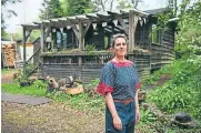  ?? ?? Sarah Mcleod with granddaugh­ter Meadow at her one-room hut in the Stirlingsh­ire hamlet of Carbeth
Pictures Andrew Cawley