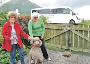  ??  ?? Elsa Rossetter, left, and Gay Eggington thanked road users for
saving their poodle, Mungo