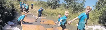  ??  ?? A total of 88 hardy souls from the Michael Smith Trust Challenge Team (MST) descended on Ashby Moto Park for a Zeus 7km obstacle mud run course.