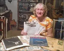  ?? CONTRIBUTE­D ?? Margaret Krolczyk, now 87, of North Palm Beach, was 12 the day of the Pearl Harbor attack on Dec. 7, 1941. Here, she is holding memorabili­a about the attack in November 2016.