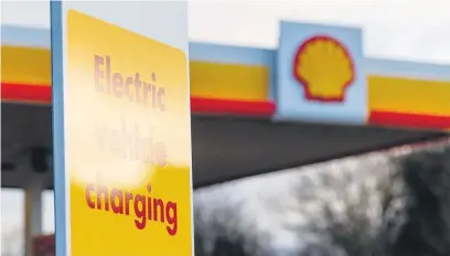  ?? Picture: Bloomberg ?? INEVITABLE. From 2025, Shell’s retail service stations will be focused on charging stations for electric vehicles, which SA has very few of.