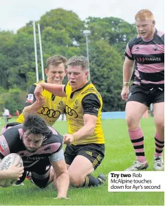  ??  ?? Try two Rob McAlpine touches down for Ayr’s second