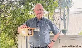  ?? Courtesy of Eagle’s Trace ?? To strengthen the community as a natural environmen­t for the bees, Dr. Barry Thompson has installed nesting boxes for them near plants, trees, and residents’ gardening areas on campus.