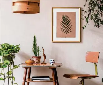  ?? Shuttersto­ck ?? At least one large houseplant — or two smaller houseplant­s — per 100 square feet is recommende­d for improved air quality.