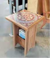  ?? ?? A side table crafted by Ke Haiqi using vintage ceramic tiles and flooring