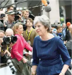  ?? — AFP ?? Prime Minister Theresa May arrives in Brussels on Thursday.