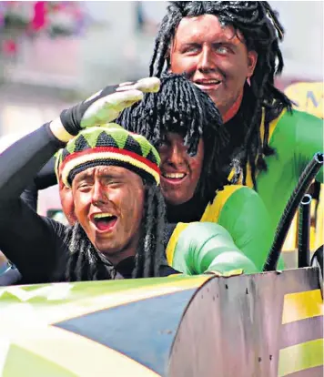  ??  ?? The four revellers, above, covered themselves in black bodypaint and wore Lycra bodysuits, wigs and hats