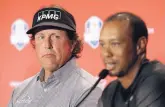  ?? AP FILE ?? Phil Mickelson, left, and Tiger Woods, shown at a news conference in September, have combined for 124 wins on the PGA Tour.