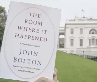  ?? ALEX BRANDON/AP ?? A copy of “The Room Where It Happened” is photograph­ed at the White House last week. A PDF version of the book has turned up on the internet.