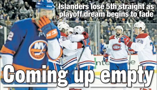  ?? Robert Sabo ?? SINKING FEELING: Islander Ross Johnston turns away as the Canadiens celebrate a third-period goal Friday at Barclays Center.